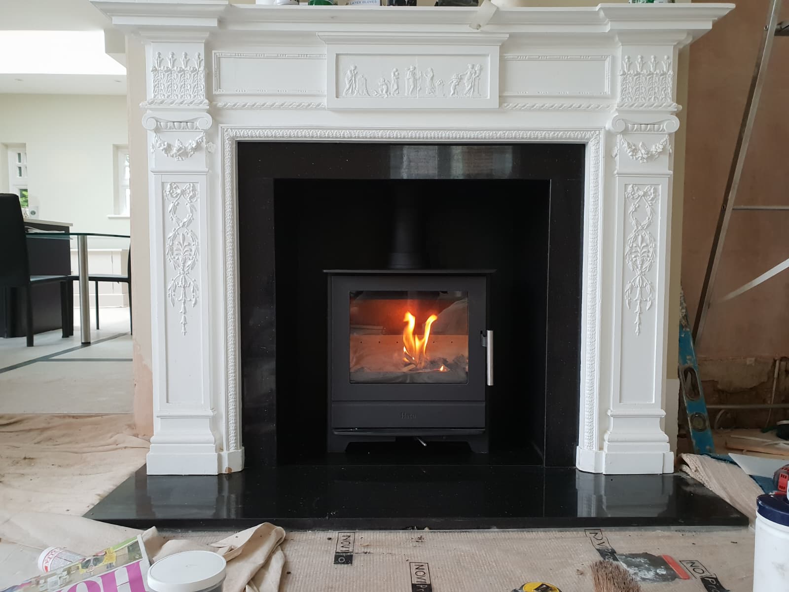 Fireplace Installations: Fireplace installation with the fire lit, by Windsor & Eton Stoves in Berkshire